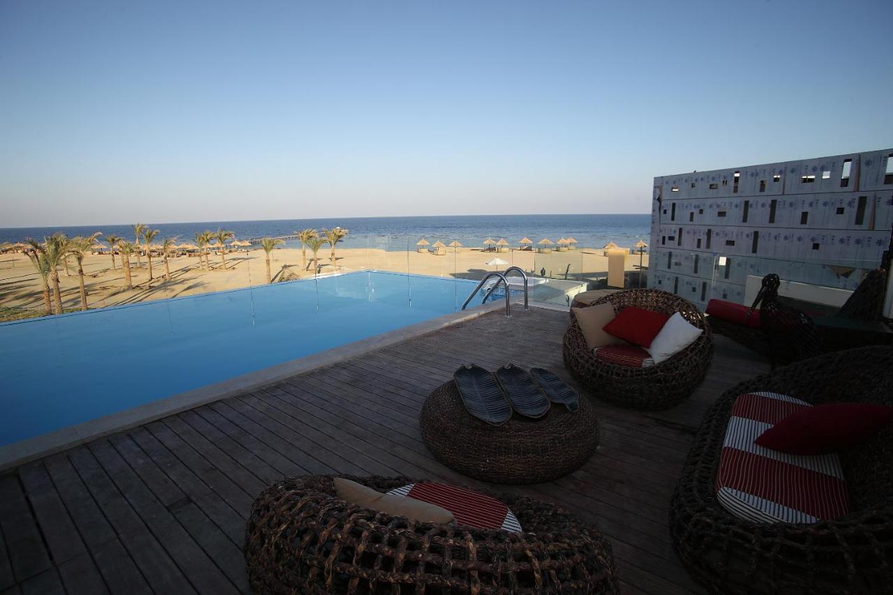 Pickalbatros The Palace Port Ghalib Exterior photo View of the pool at the Hilton Sharm El Sheikh